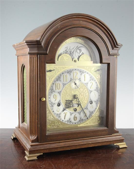 A Victorian style oak cased chiming bracket clock, 15in.